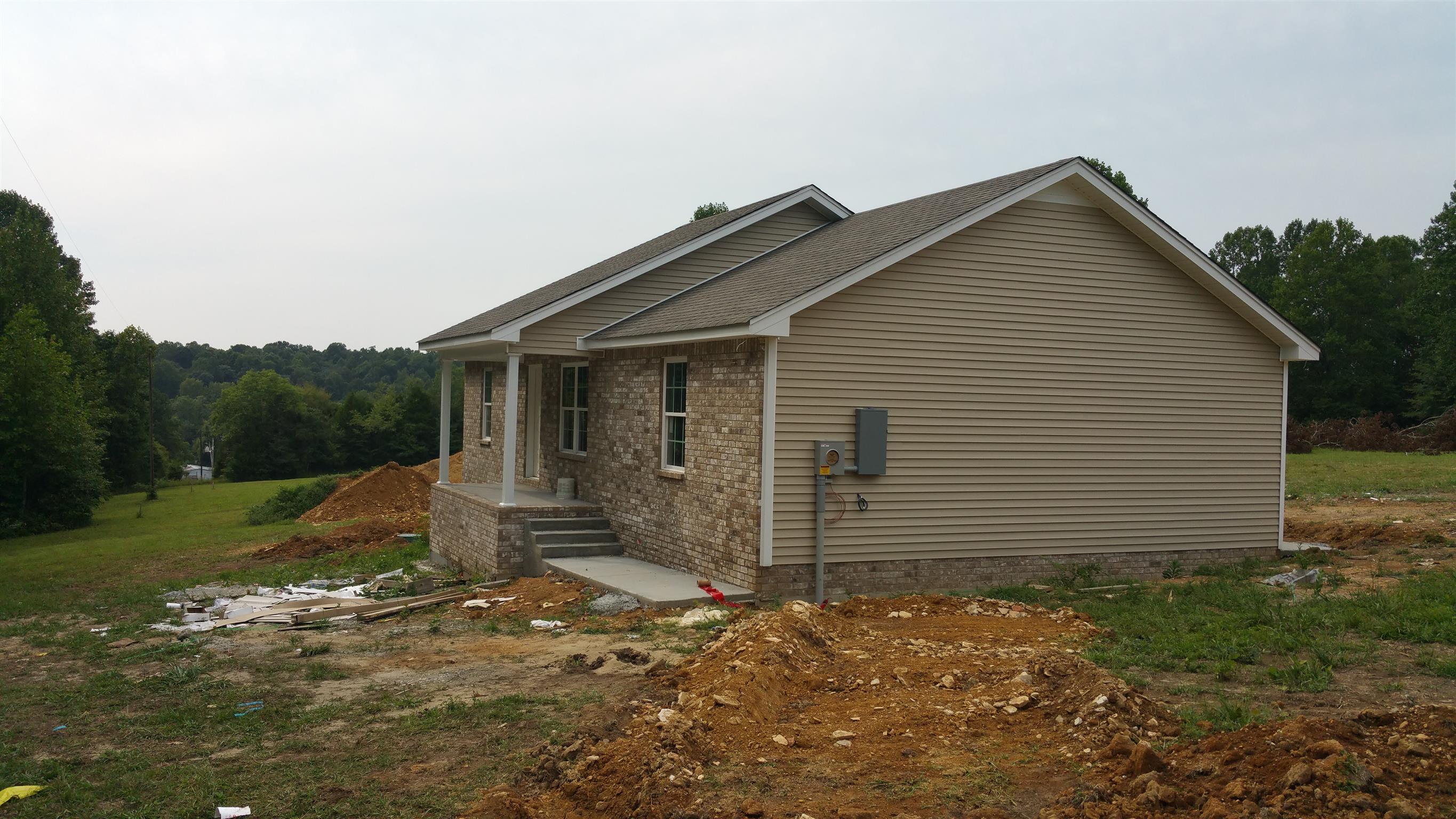 1219 East Ab Wade Road Portland, TN 37148 - Photo 2 of 3 a front view of house with yard