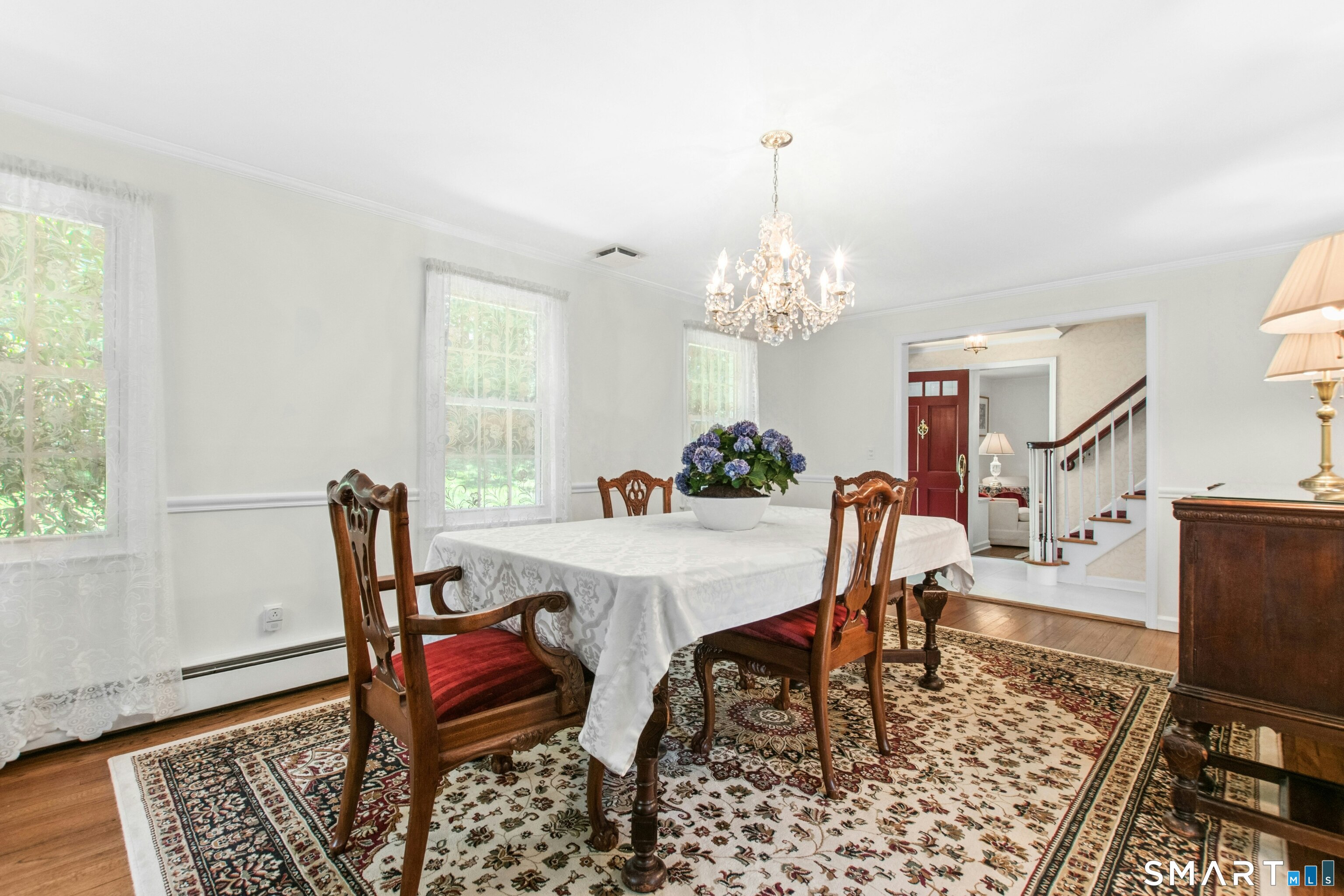 47 Pine Ridge Road Wilton, CT 06897 - Photo 20 of 40 On the right, the elegant, expansive Dining Room that can host formal dinner parties for 14+ guests. Parties starting in the large dining room off the kitchen, naturally flow outward to the many interconnected indoor and outdoor fluid spaces.