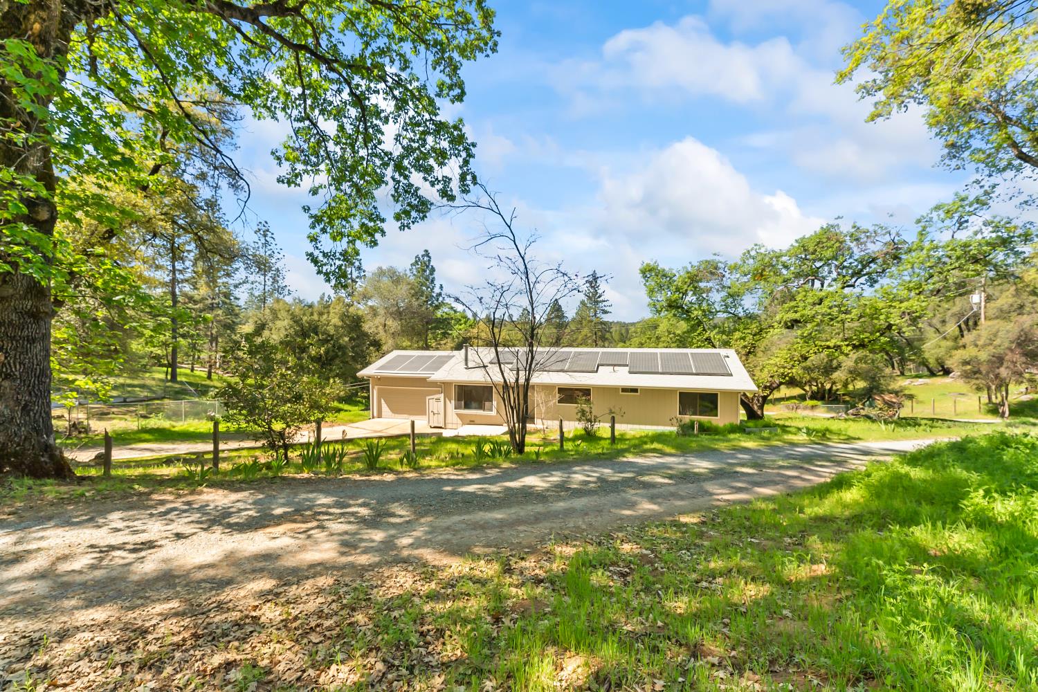 4705 Sand Ridge Road Placerville, CA 95667 - Photo 1 of 36 a view of residential houses with yard and swimming pool