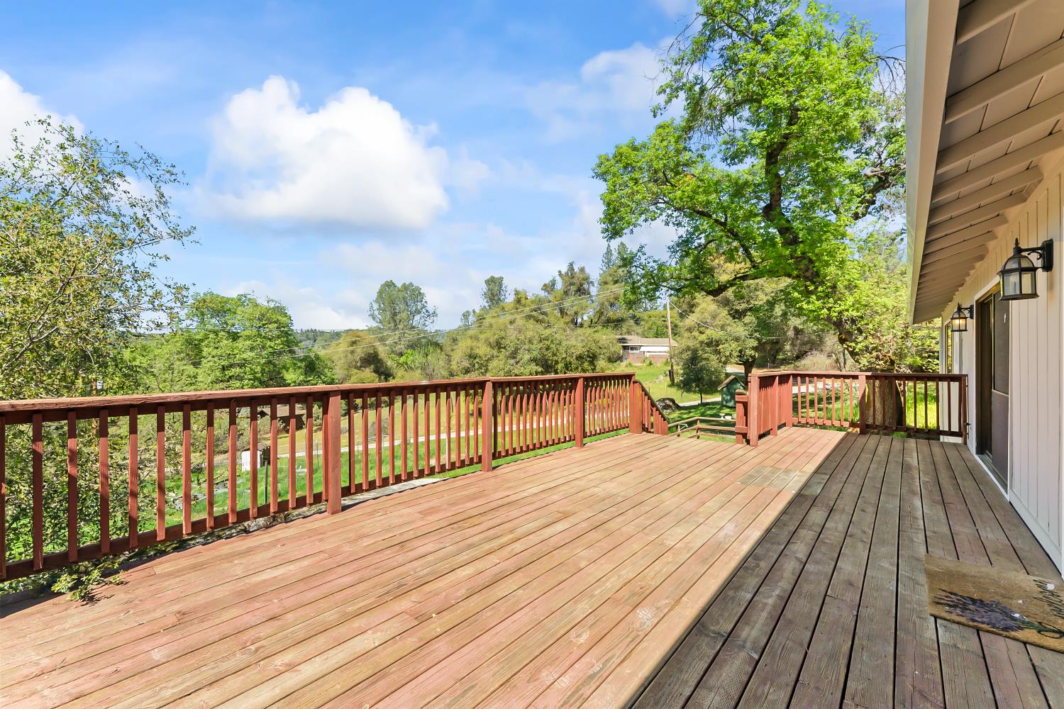 4705 Sand Ridge Road Placerville, CA 95667 - Photo 12 of 36 a view of balcony with wooden floor and fence