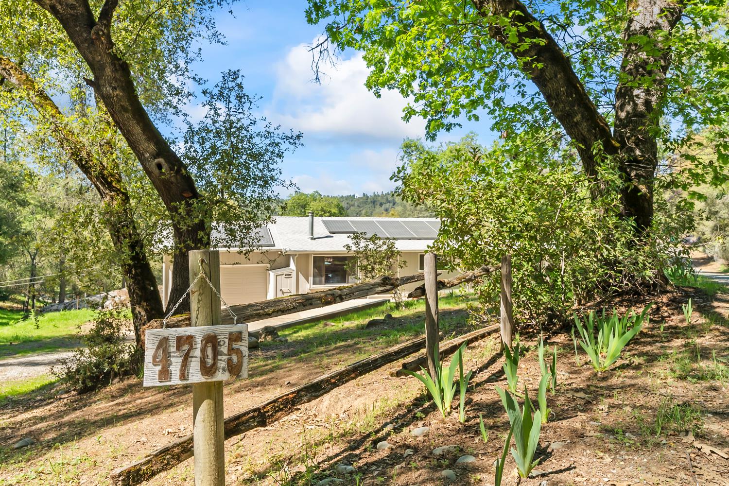4705 Sand Ridge Road Placerville, CA 95667 - Photo 36 of 36 a view of a house with a small yard