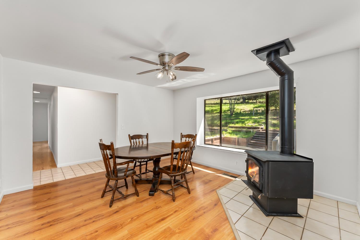 4705 Sand Ridge Road Placerville, CA 95667 - Photo 4 of 36 a view of a dining room with furniture and a window