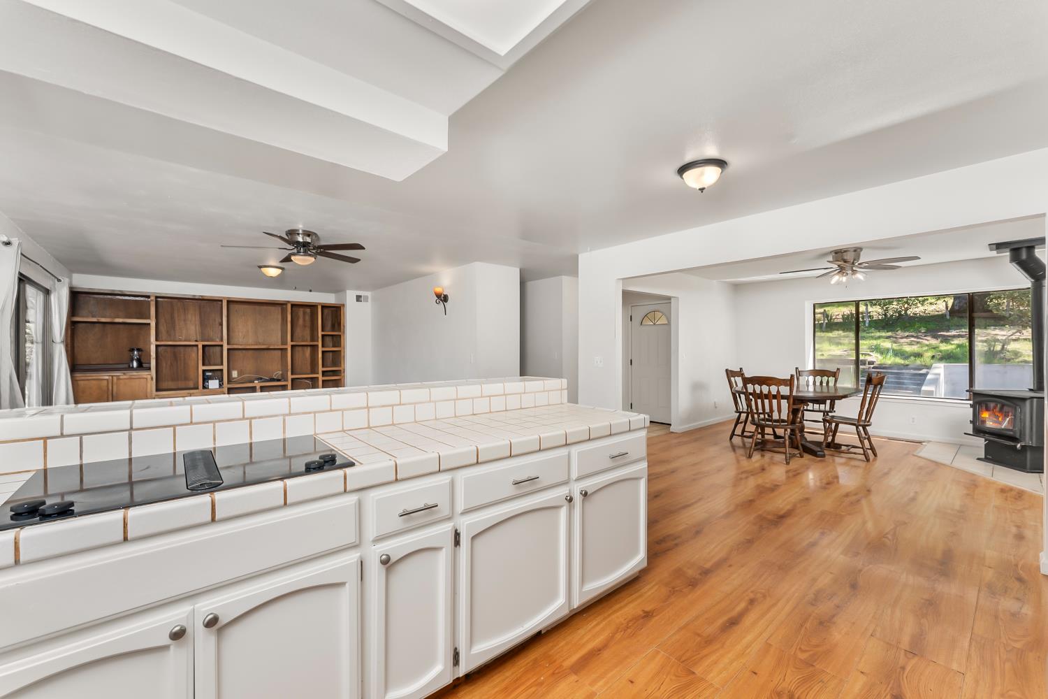 4705 Sand Ridge Road Placerville, CA 95667 - Photo 6 of 36 a kitchen with counter and chairs