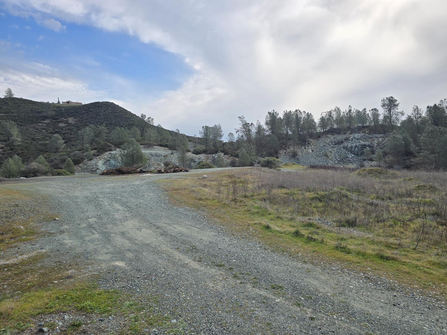 0 Lisa Lane Placerville, CA 95667 - Photo 4 of 4 a view of a dry field with trees in the background