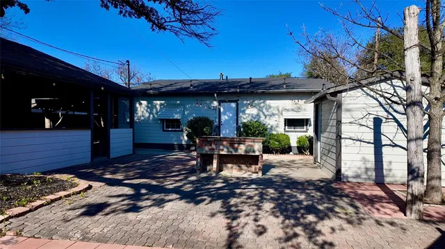 a view of a chairs and tables in the patio