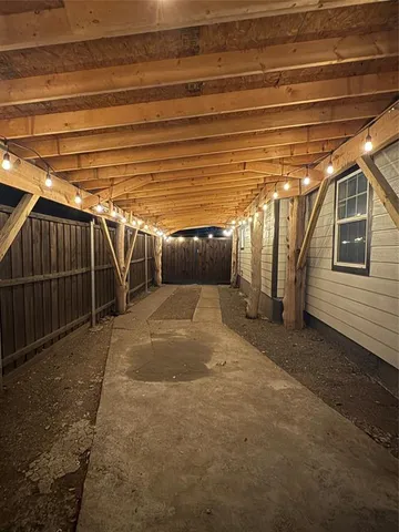 a view of a room with wooden walls