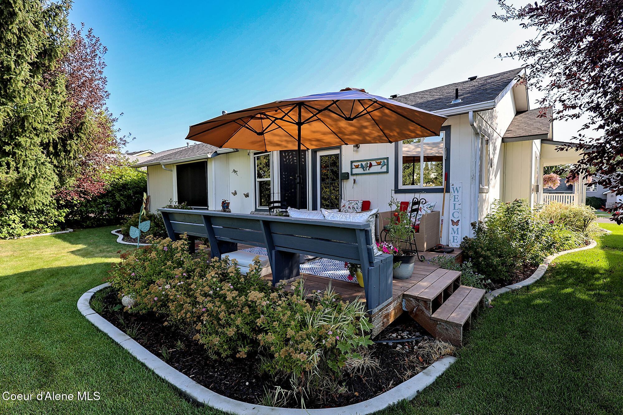 2815 North Slice Drive Post Falls, ID 83854 - Photo 34 of 55 Back Deck with umbrella 2