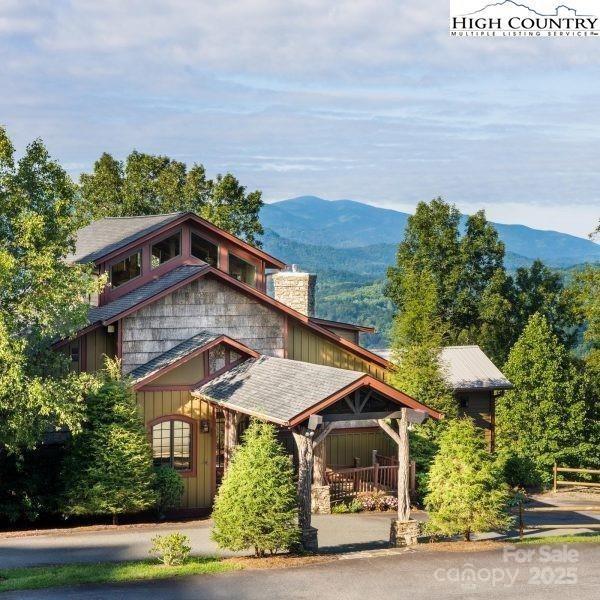 Tbd Tbd Stack Road, Unit 9 Elk Park, NC 28622 - Photo 5 of 18 a front view of a house with a yard
