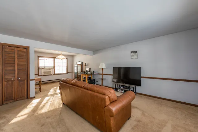a view of a livingroom with furniture