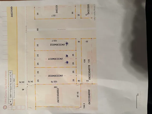 a view of house with a yard and covered with snow in the outdoor