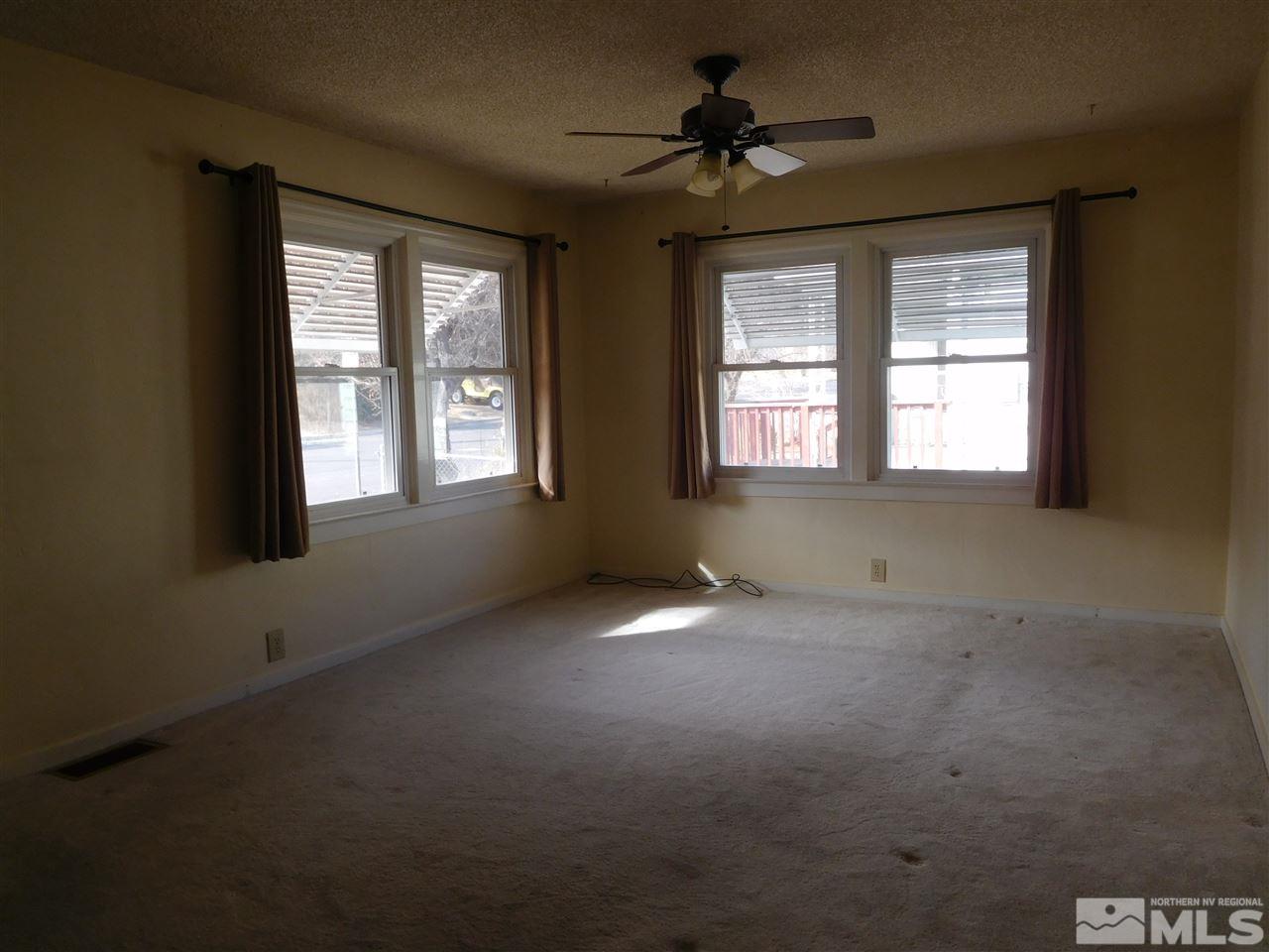 1160 The Strand Reno, NV 89503 - Photo 3 of 14 a view of an empty room with a window