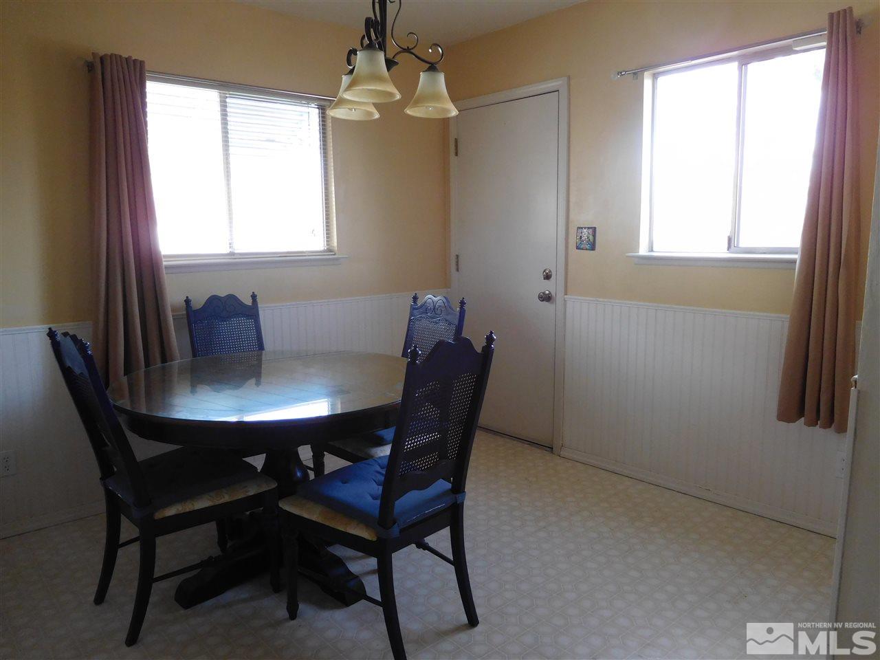 1160 The Strand Reno, NV 89503 - Photo 7 of 14 a view of a dining room with furniture and window