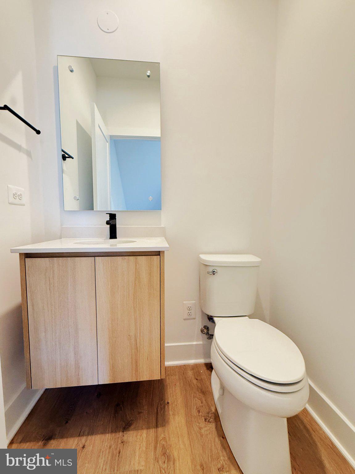 33 Lower Service Court Northwest Washington, DC 20001 - Photo 17 of 51 Sleek and modern half-bath retreat.