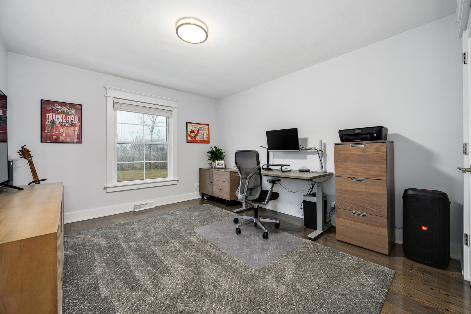 1627 Del Ogier Drive Glenview, IL 60025 - Photo 21 of 37 a view of a workspace with furniture and a window
