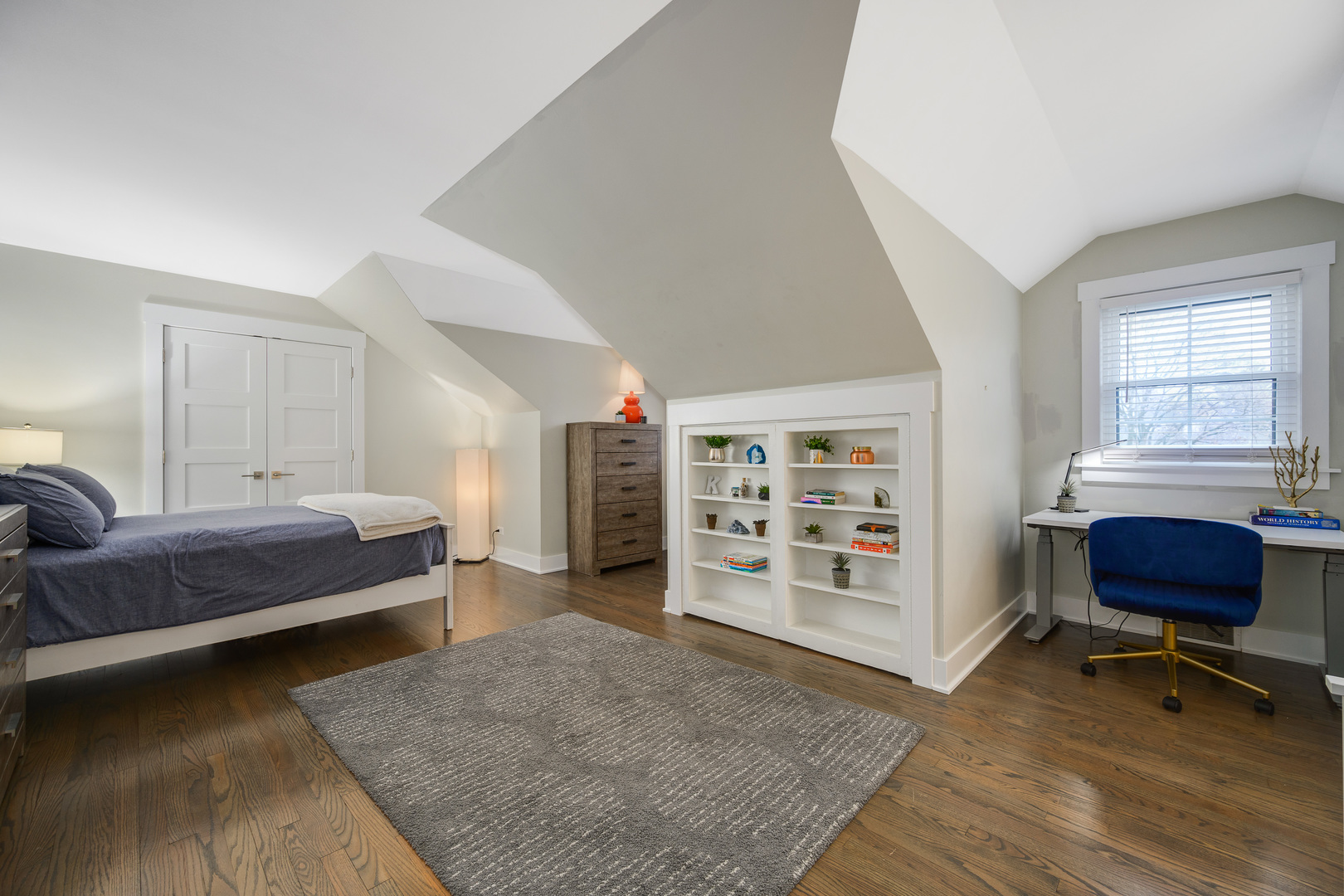 1627 Del Ogier Drive Glenview, IL 60025 - Photo 23 of 37 a bedroom with furniture and a chair