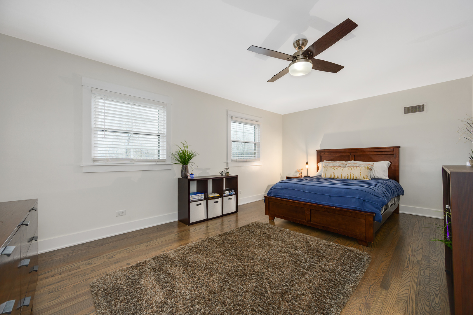 1627 Del Ogier Drive Glenview, IL 60025 - Photo 25 of 37 a bedroom with a bed and window