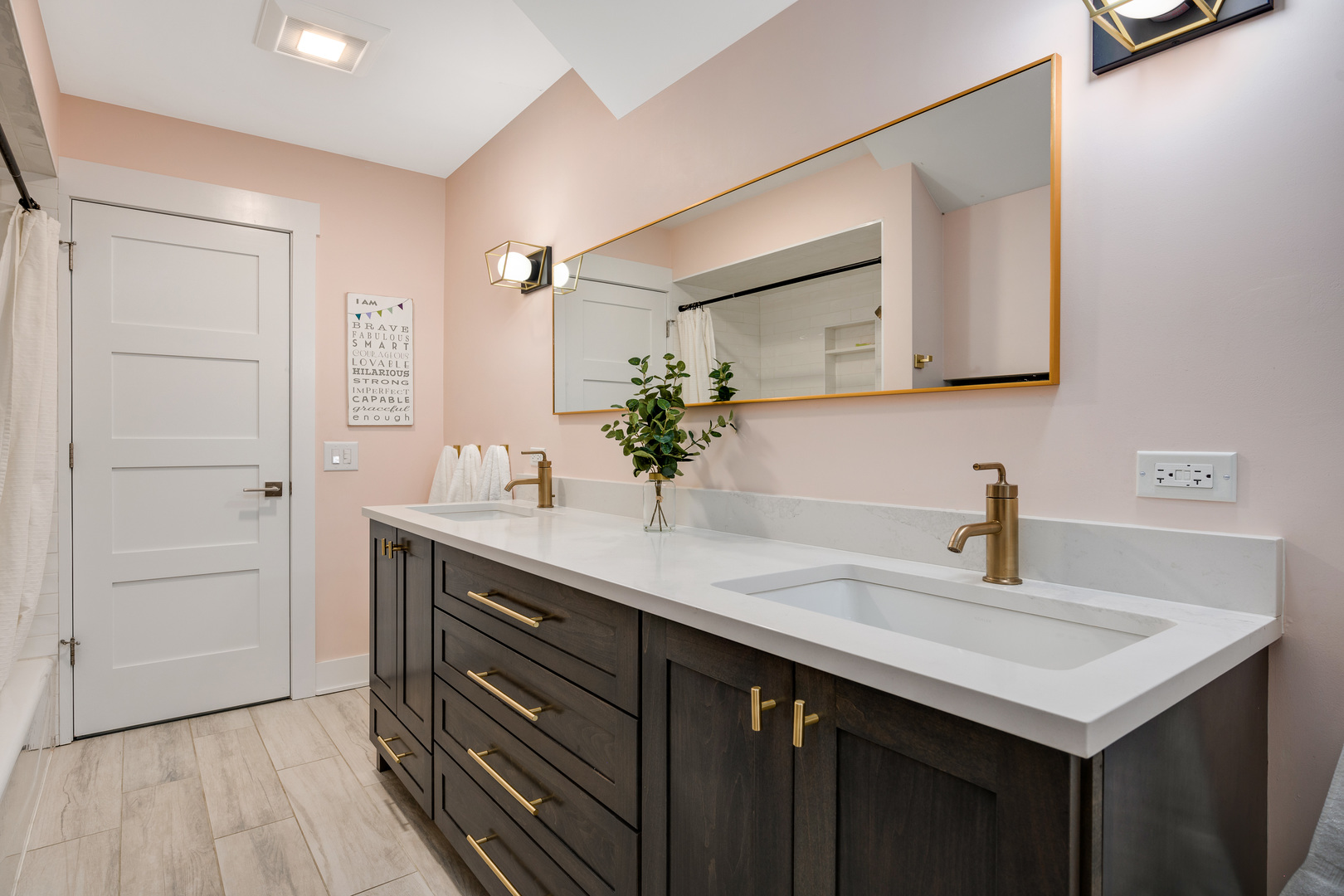 1627 Del Ogier Drive Glenview, IL 60025 - Photo 26 of 37 a bathroom with a sink and a mirror