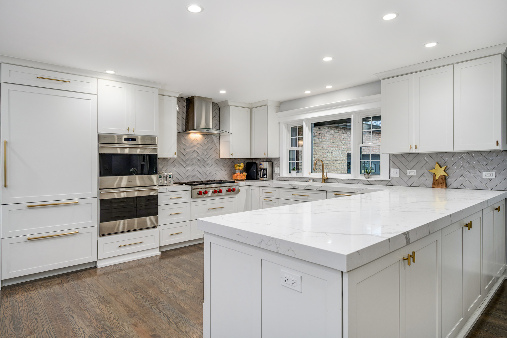 1627 Del Ogier Drive Glenview, IL 60025 - Photo 7 of 37 a kitchen with stainless steel appliances granite countertop a sink and cabinets