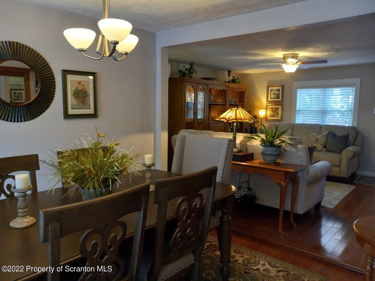 19 Tree Top Road Tunkhannock, PA 18657 - Photo 8 of 33 a living room with furniture flowerpot and window
