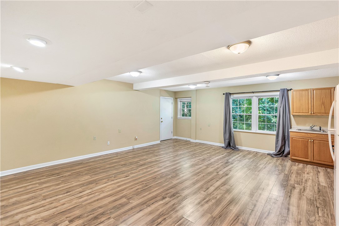 2011 Forest Drive Seneca, SC 29672 - Photo 31 of 36 A versatile open-concept living space features warm wood flooring and ample natural light.