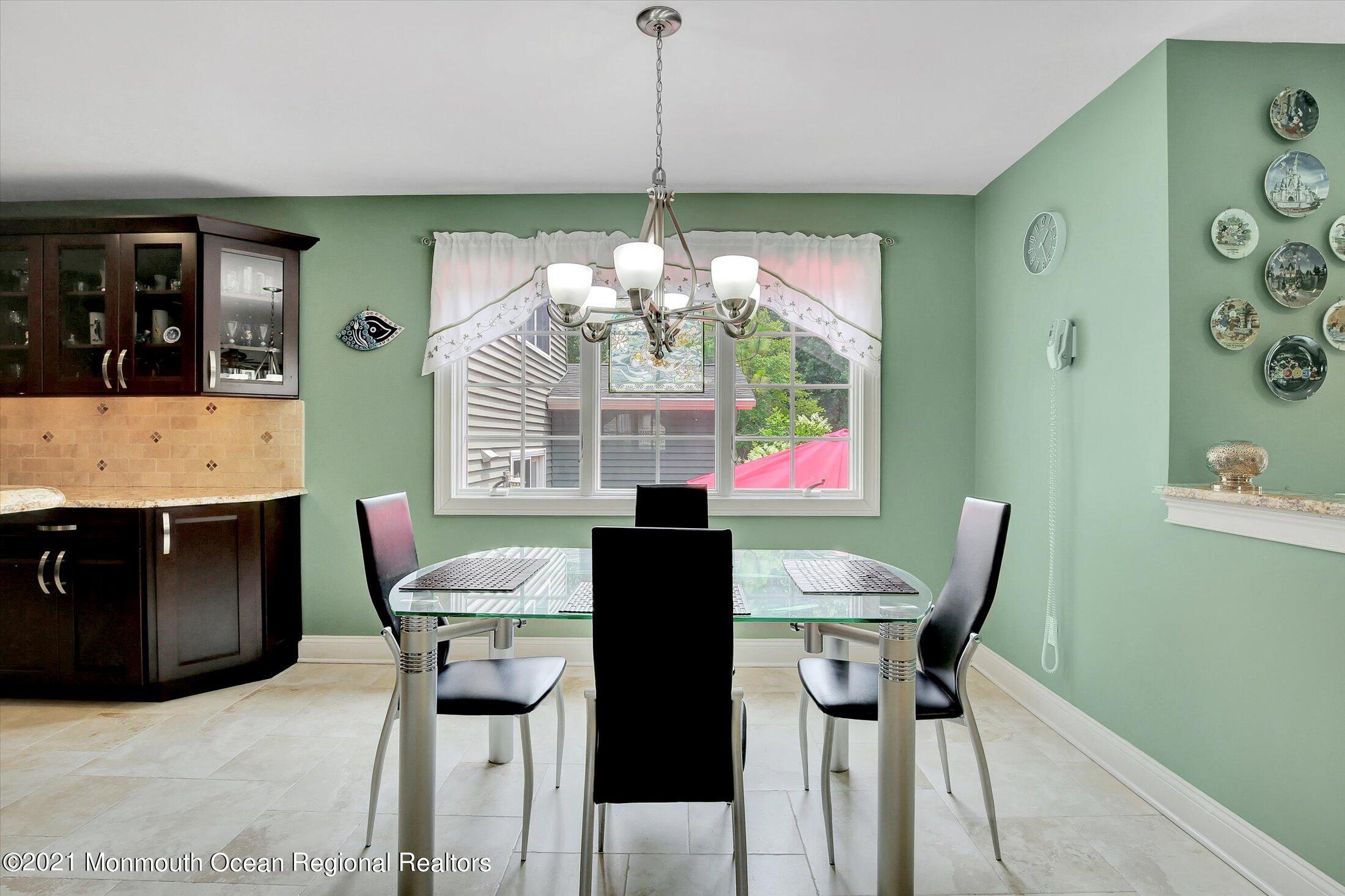 76 Swimming River Road Lincroft, NJ 07738 - Photo 22 of 50 a dining room with furniture and window