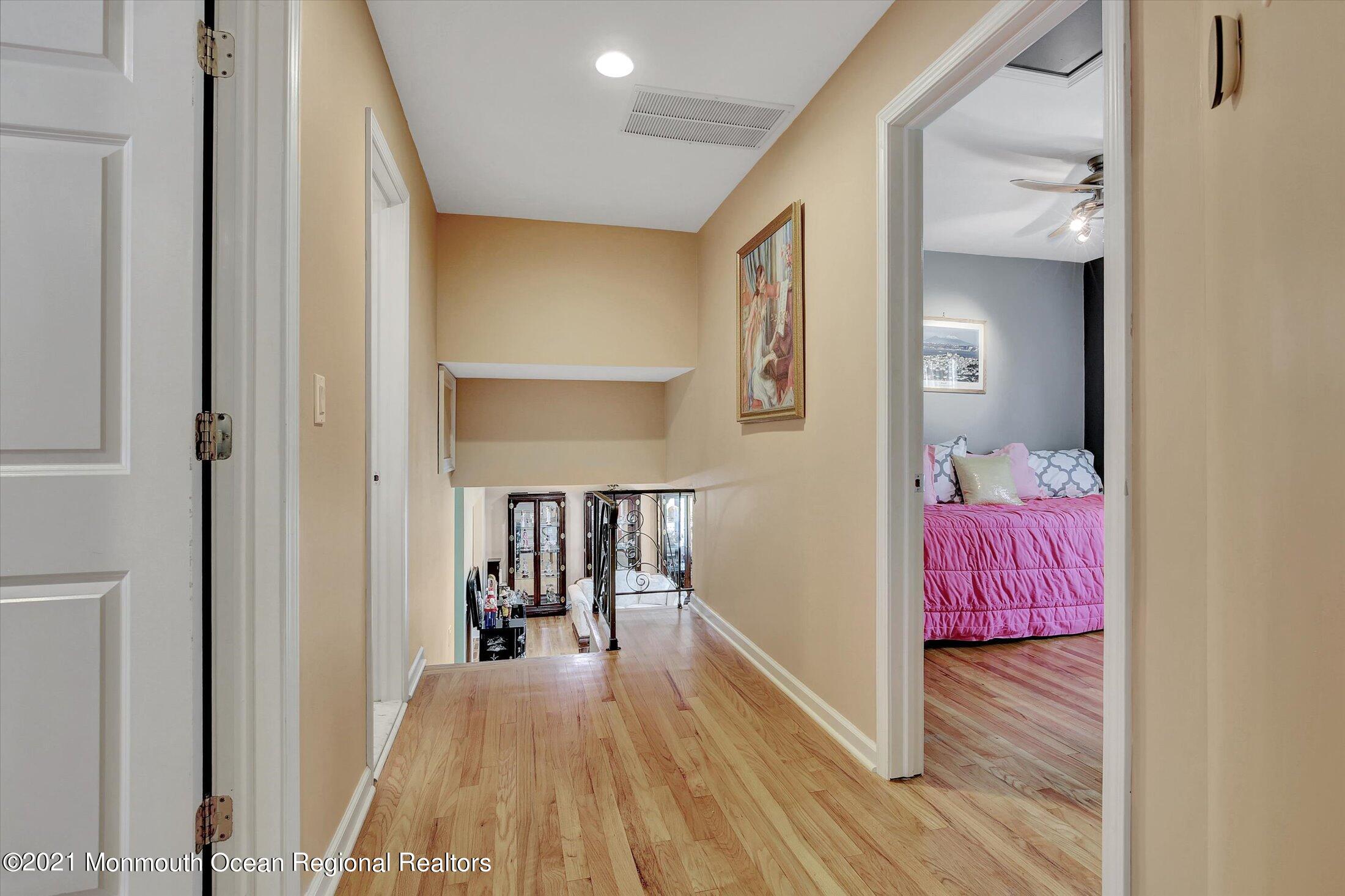 76 Swimming River Road Lincroft, NJ 07738 - Photo 27 of 50 a view of bedroom with wooden floor