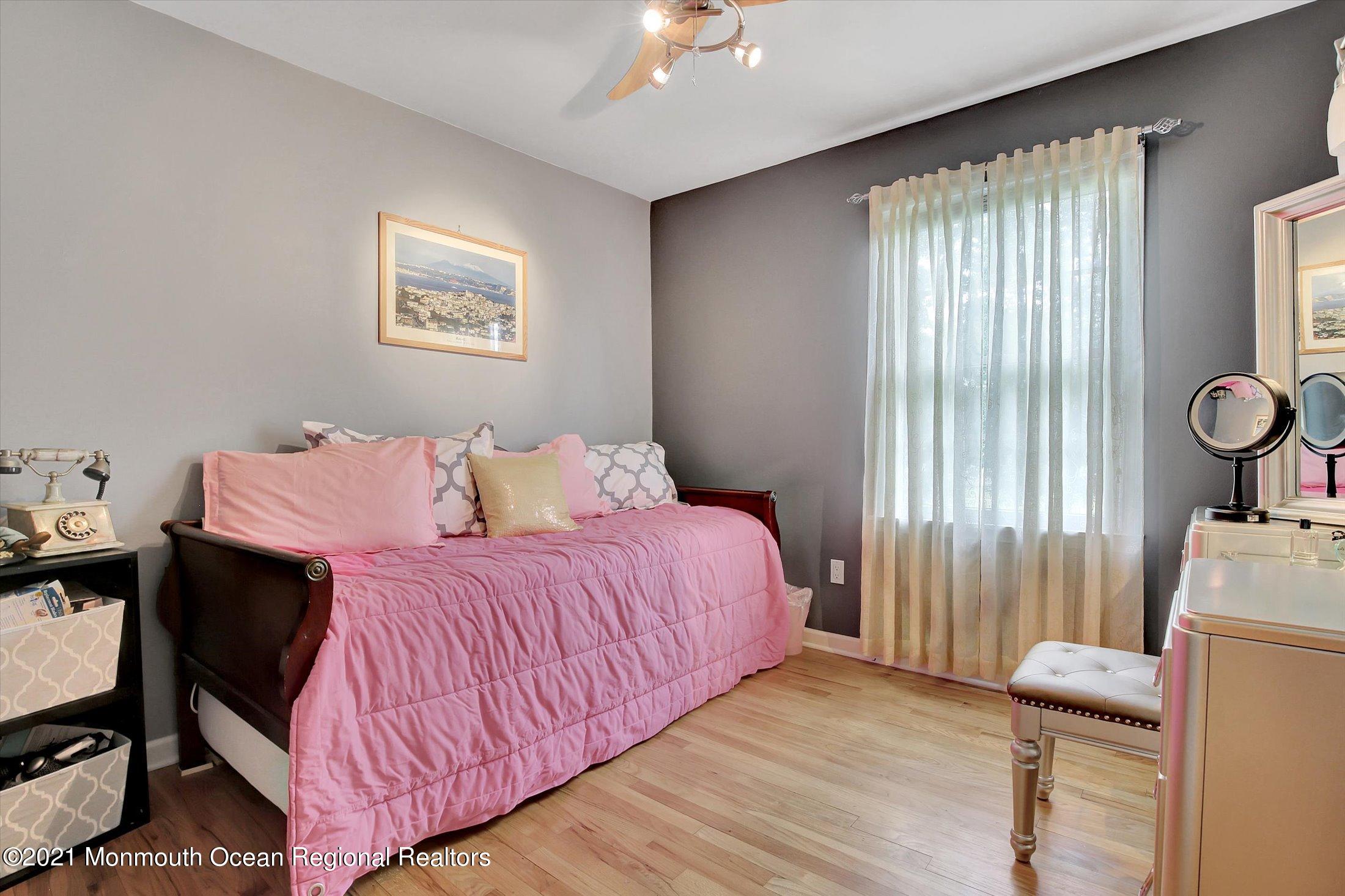 76 Swimming River Road Lincroft, NJ 07738 - Photo 35 of 50 a bedroom with bed and a window