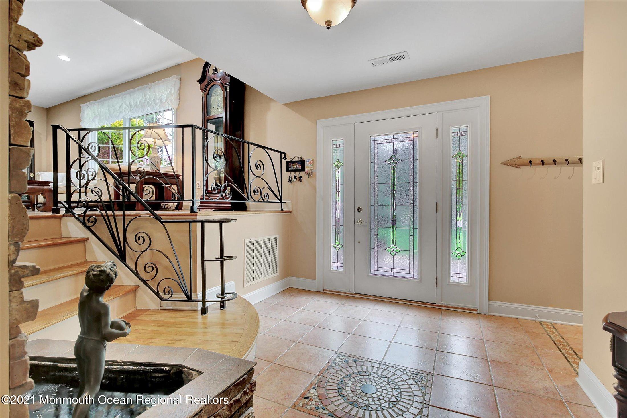 76 Swimming River Road Lincroft, NJ 07738 - Photo 6 of 50 a view of entryway with a front door