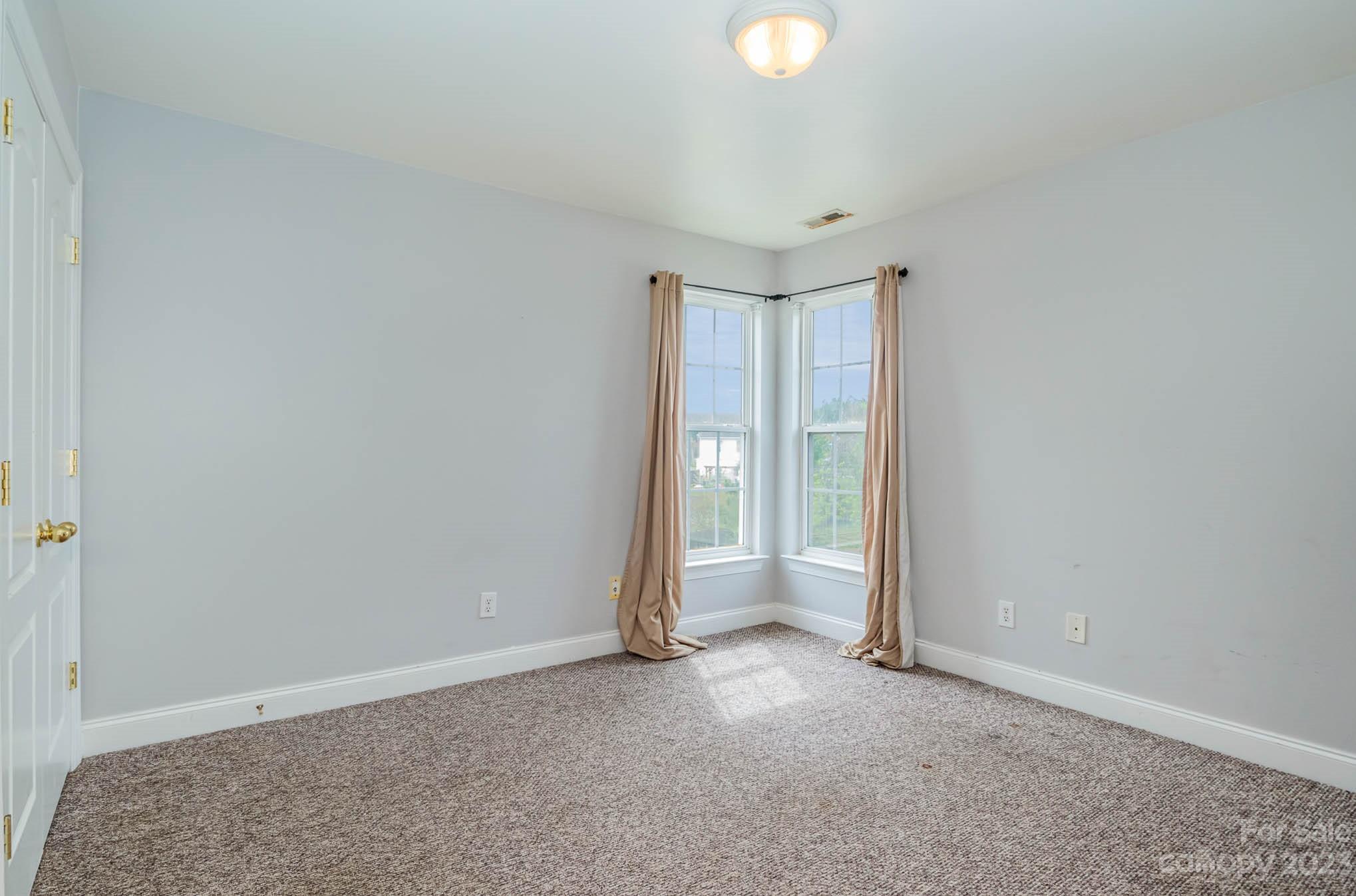 2719 Spring Breeze Way Monroe, NC 28110 - Photo 19 of 25 a view of an empty room