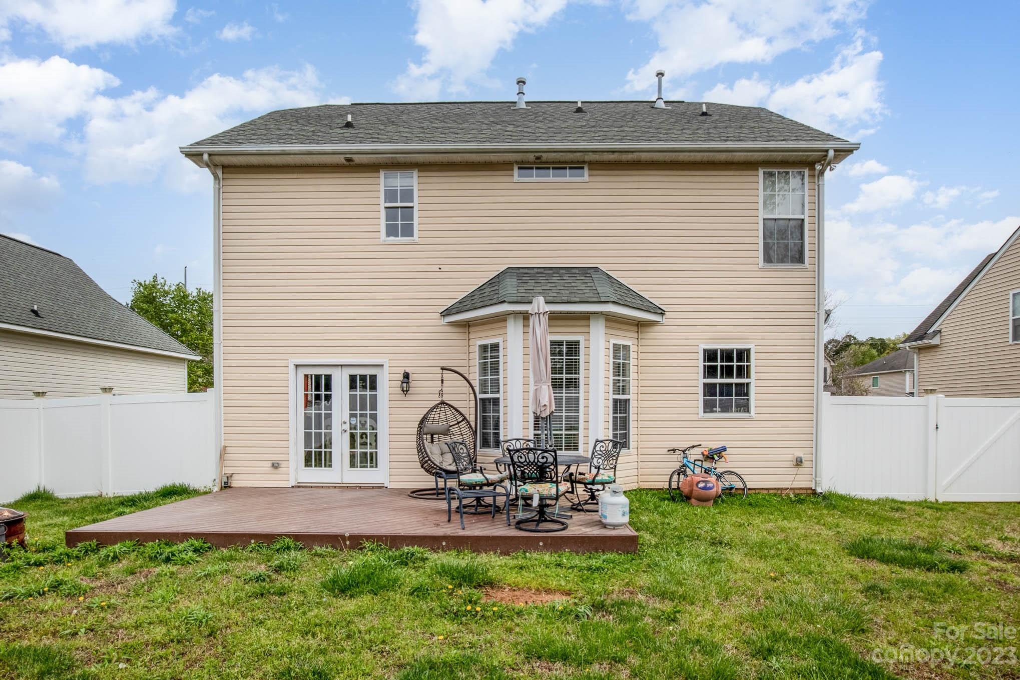 2719 Spring Breeze Way Monroe, NC 28110 - Photo 22 of 25 a front view of a house with patio