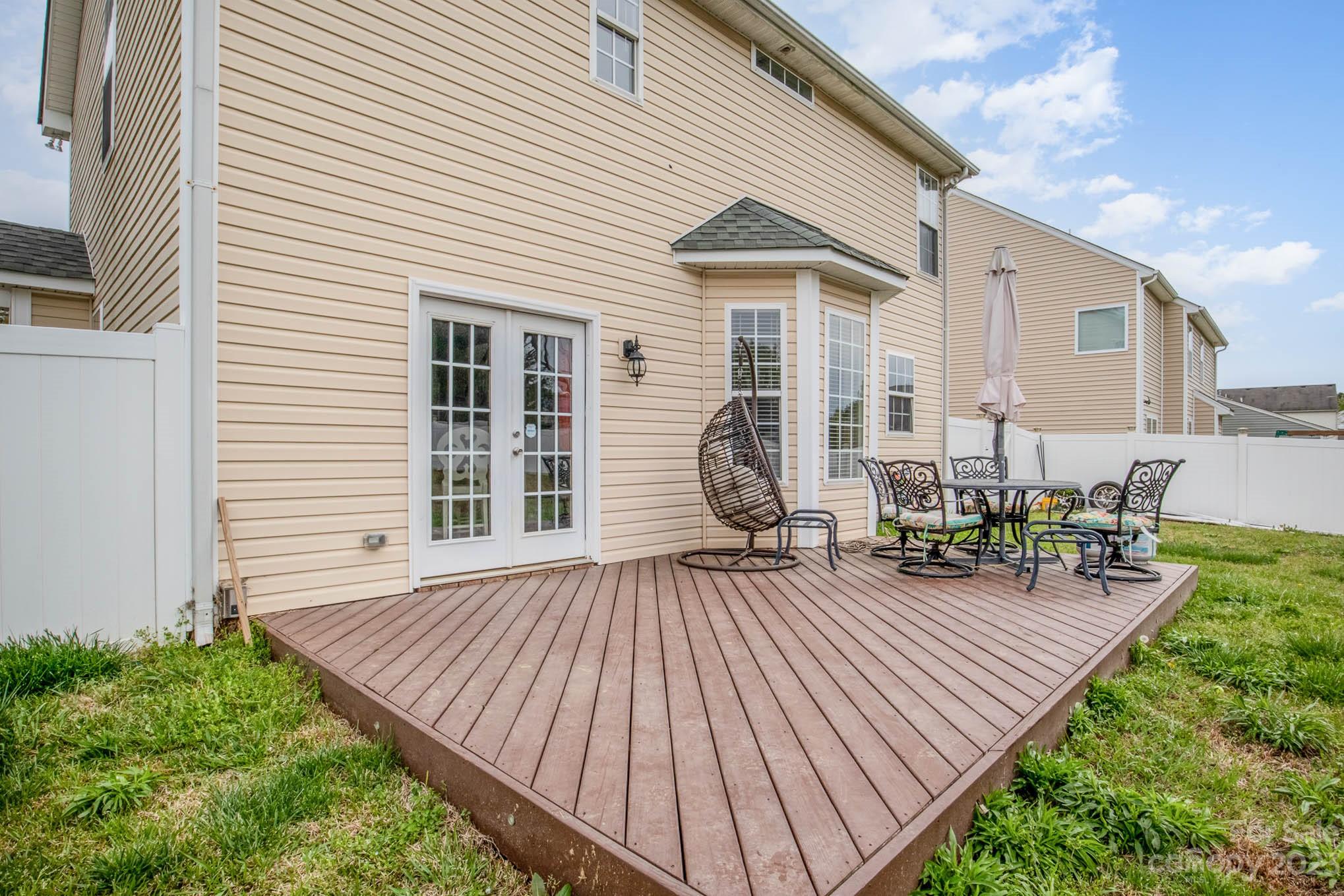 2719 Spring Breeze Way Monroe, NC 28110 - Photo 23 of 25 a view of a house with backyard and sitting area