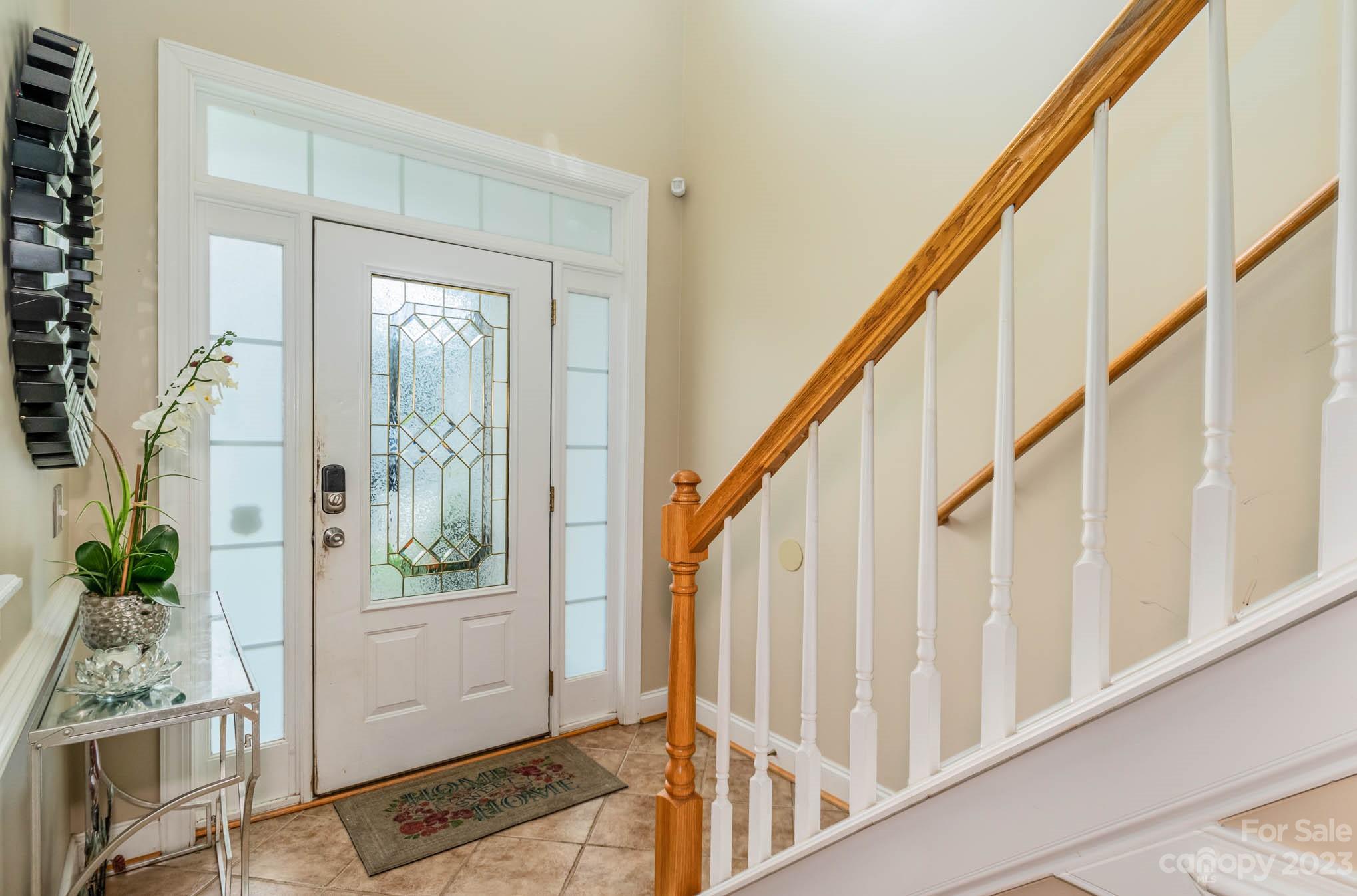2719 Spring Breeze Way Monroe, NC 28110 - Photo 9 of 25 a view of an entryway with wooden floor and door