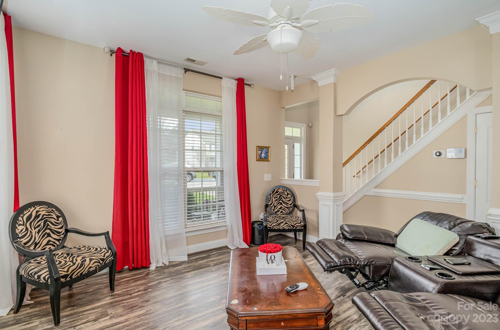 2719 Spring Breeze Way Monroe, NC 28110 - Photo 10 of 25 a living room with furniture