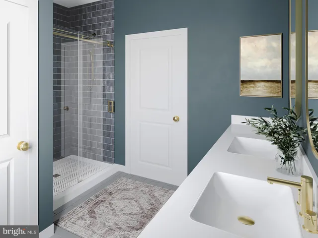 a bathroom with a tub and sink