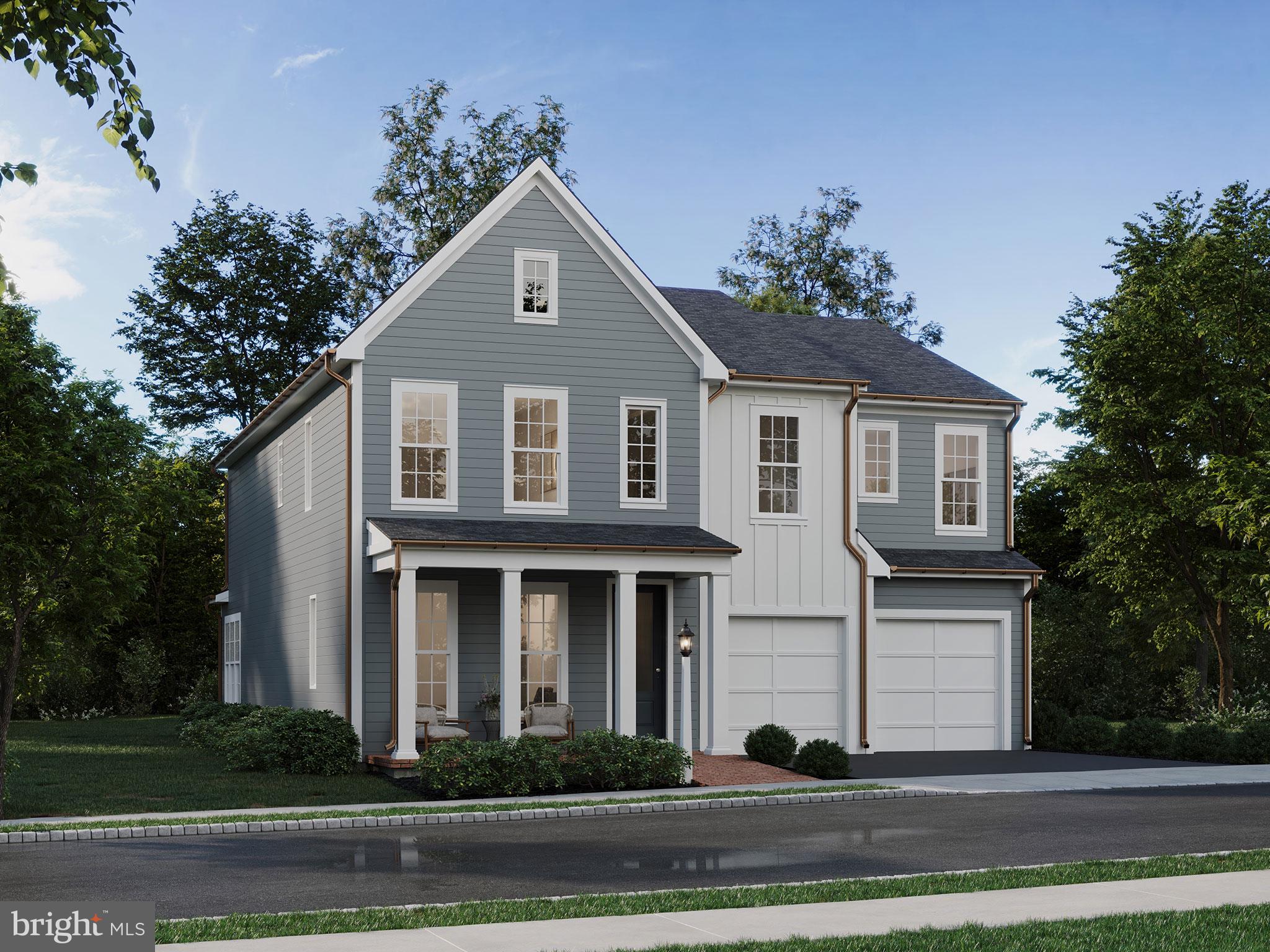 104 Merchant Avenue, Unit ARUNDEL Mount Joy, PA 17552 - Photo 24 of 38 a front view of a house with a yard