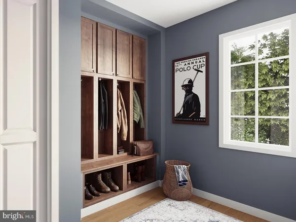 a view of front door and bedroom