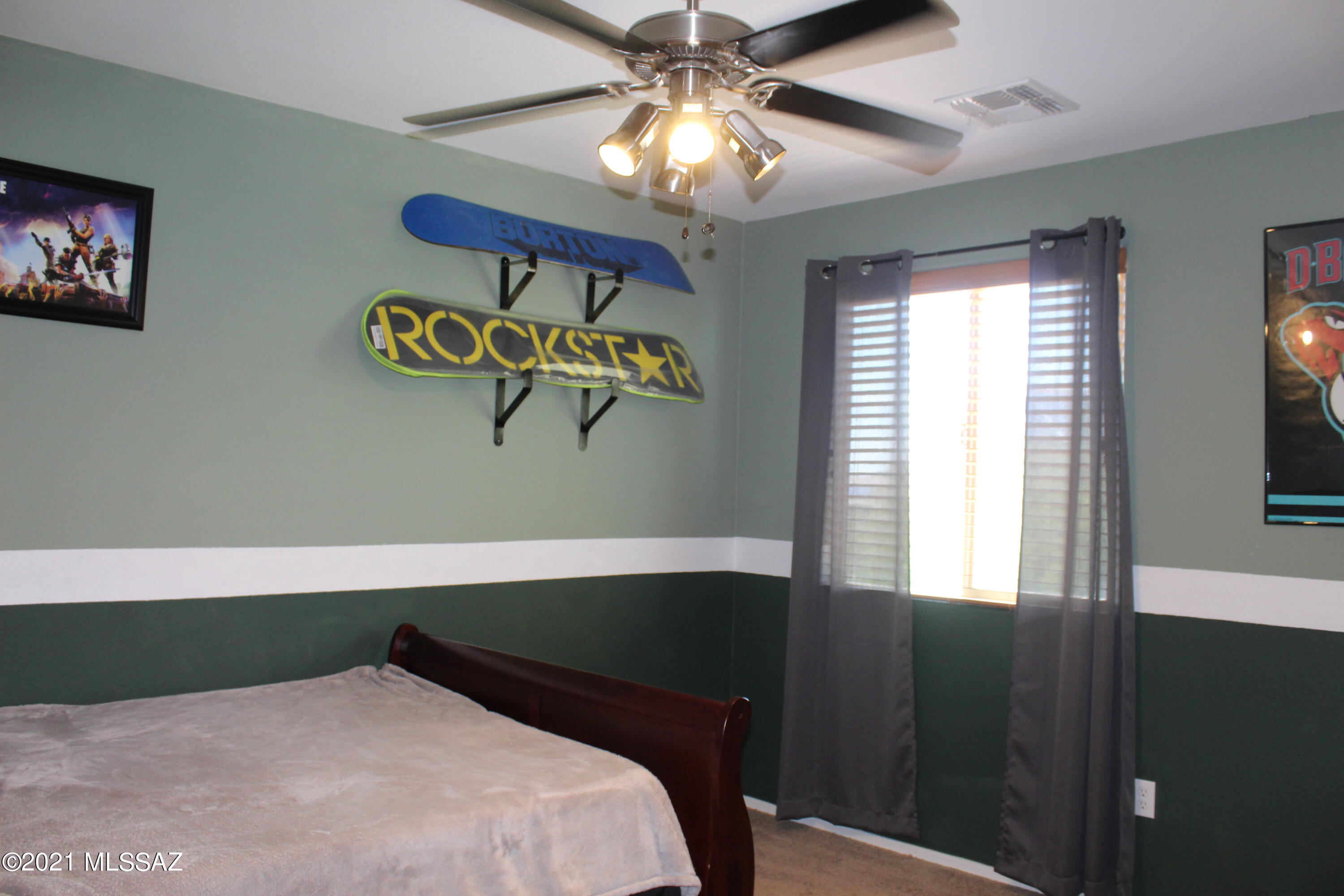 20951 East Reunion Road Red Rock, AZ 85145 - Photo 26 of 35 a bedroom with a bed and a window