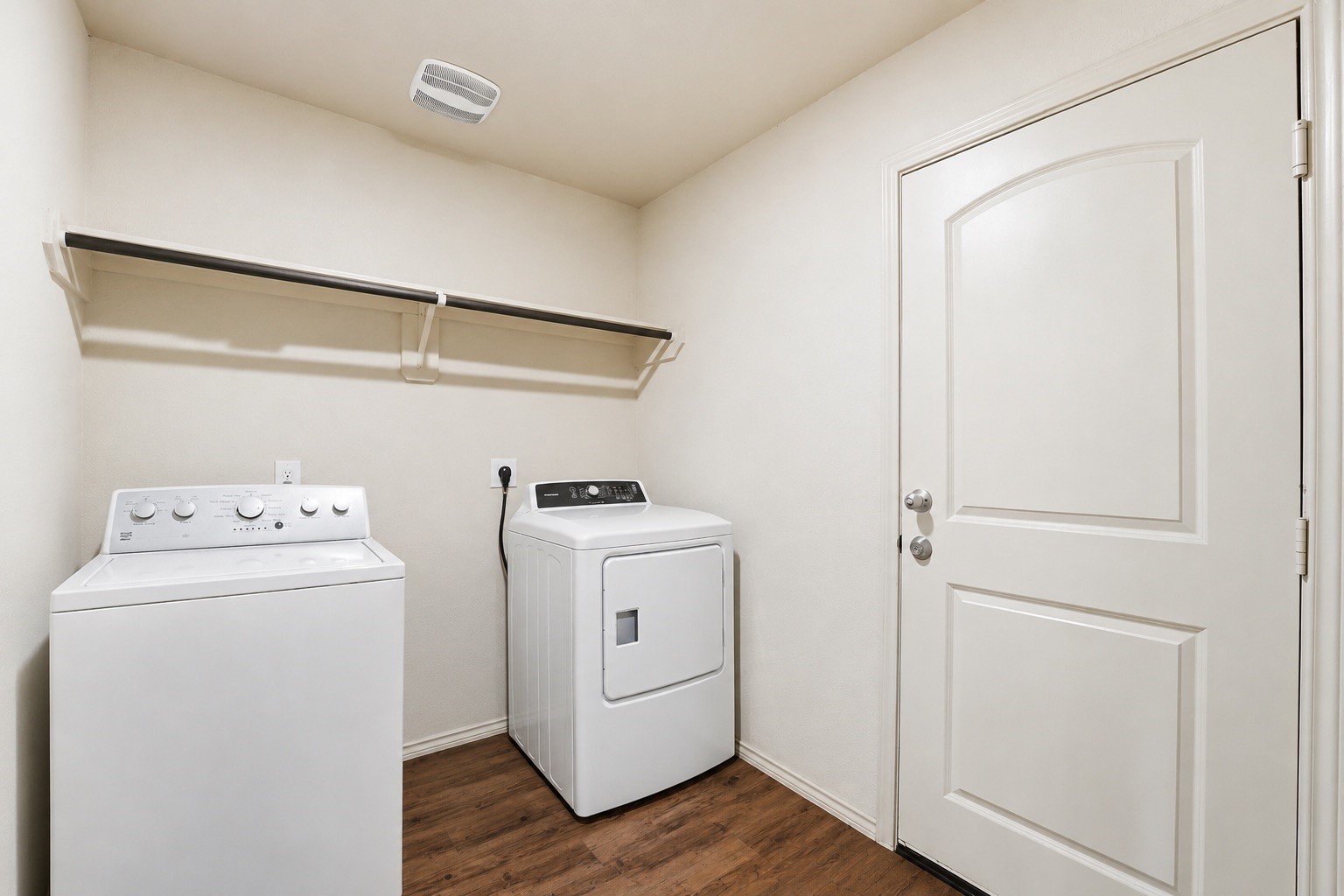 15455 Rancho Joya Way Houston, TX 77049 - Photo 17 of 20 a view of storage and utility room with washer and dryer
