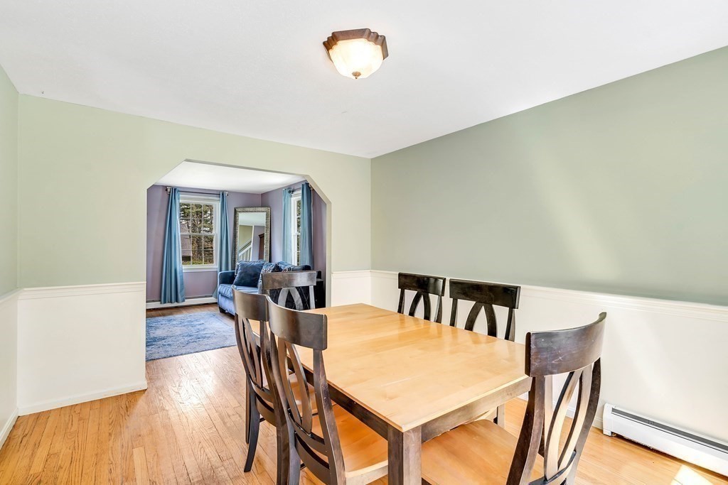 14 Puddingstone Lane Medway, MA 02053 - Photo 11 of 39 a view of a dining room with furniture and wooden floor