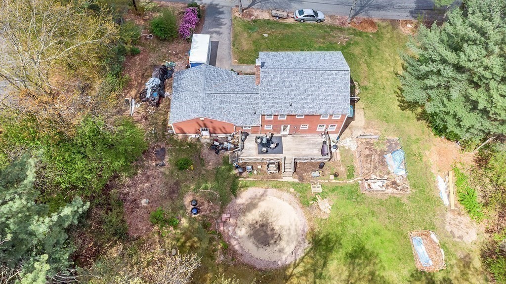 14 Puddingstone Lane Medway, MA 02053 - Photo 33 of 39 a aerial view of a house with swimming pool and large trees