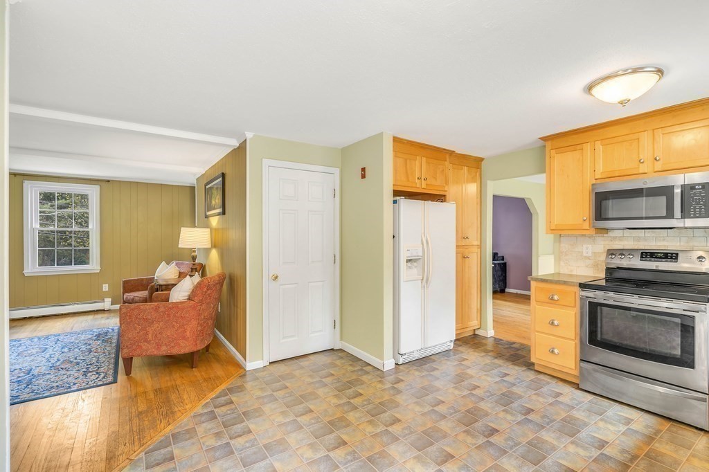 14 Puddingstone Lane Medway, MA 02053 - Photo 5 of 39 a bedroom with a bed and furniture