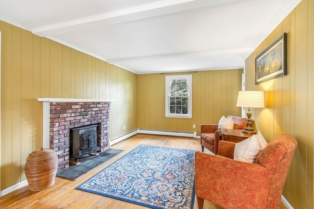14 Puddingstone Lane Medway, MA 02053 - Photo 8 of 39 a living room with furniture and a fireplace