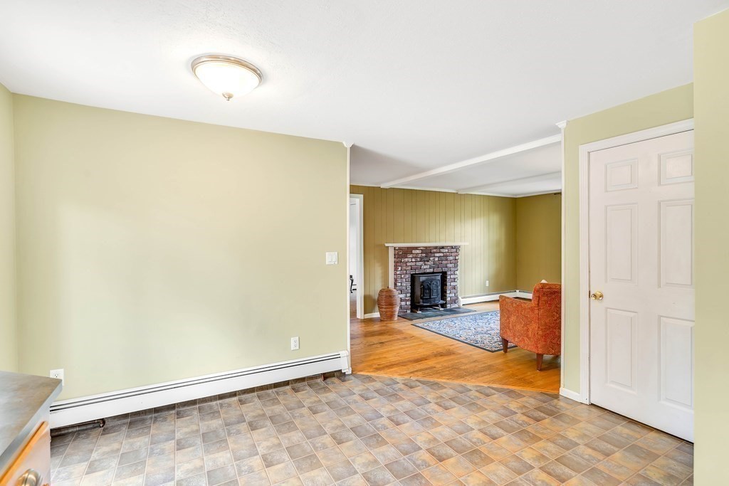 14 Puddingstone Lane Medway, MA 02053 - Photo 9 of 39 a view of a livingroom with a fireplace