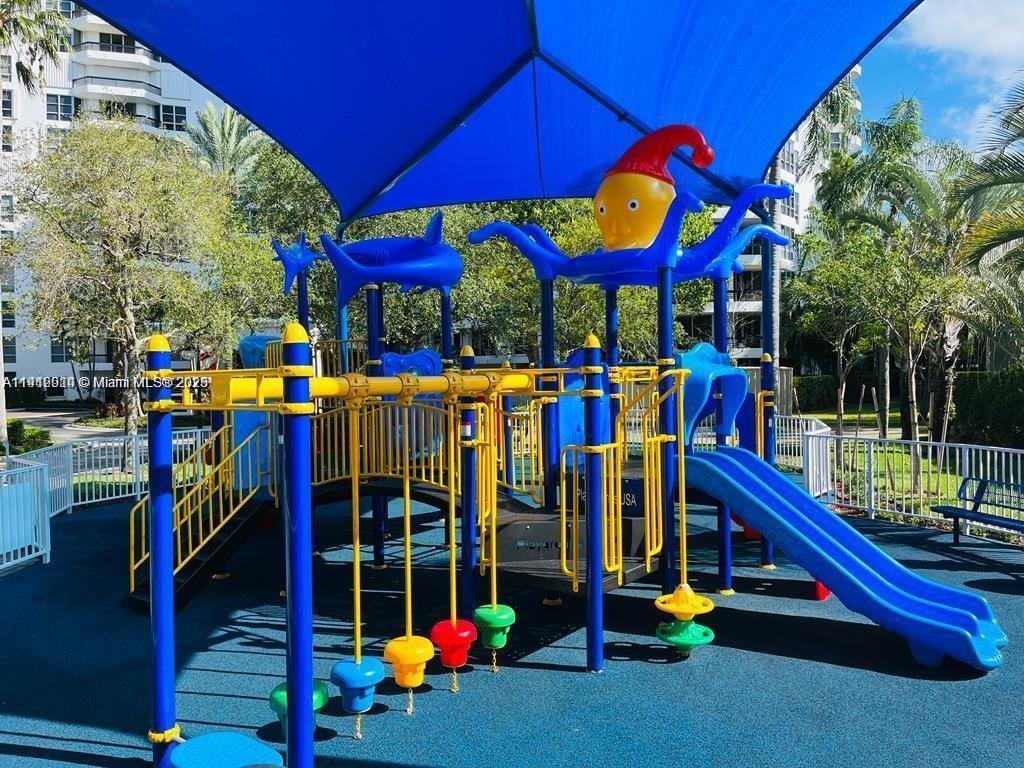 3530 Mystic Pointe Drive, Unit 1708 Aventura, FL 33180 - Photo 26 of 27 a view of outdoor space with porch and outdoor seating