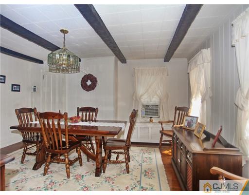 88 Halsey Reed Road Cranbury, NJ 08512 - Photo 7 of 18 a view of a dining room with furniture window and chandelier