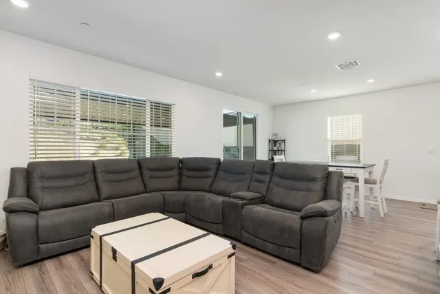 a living room with furniture and a couch