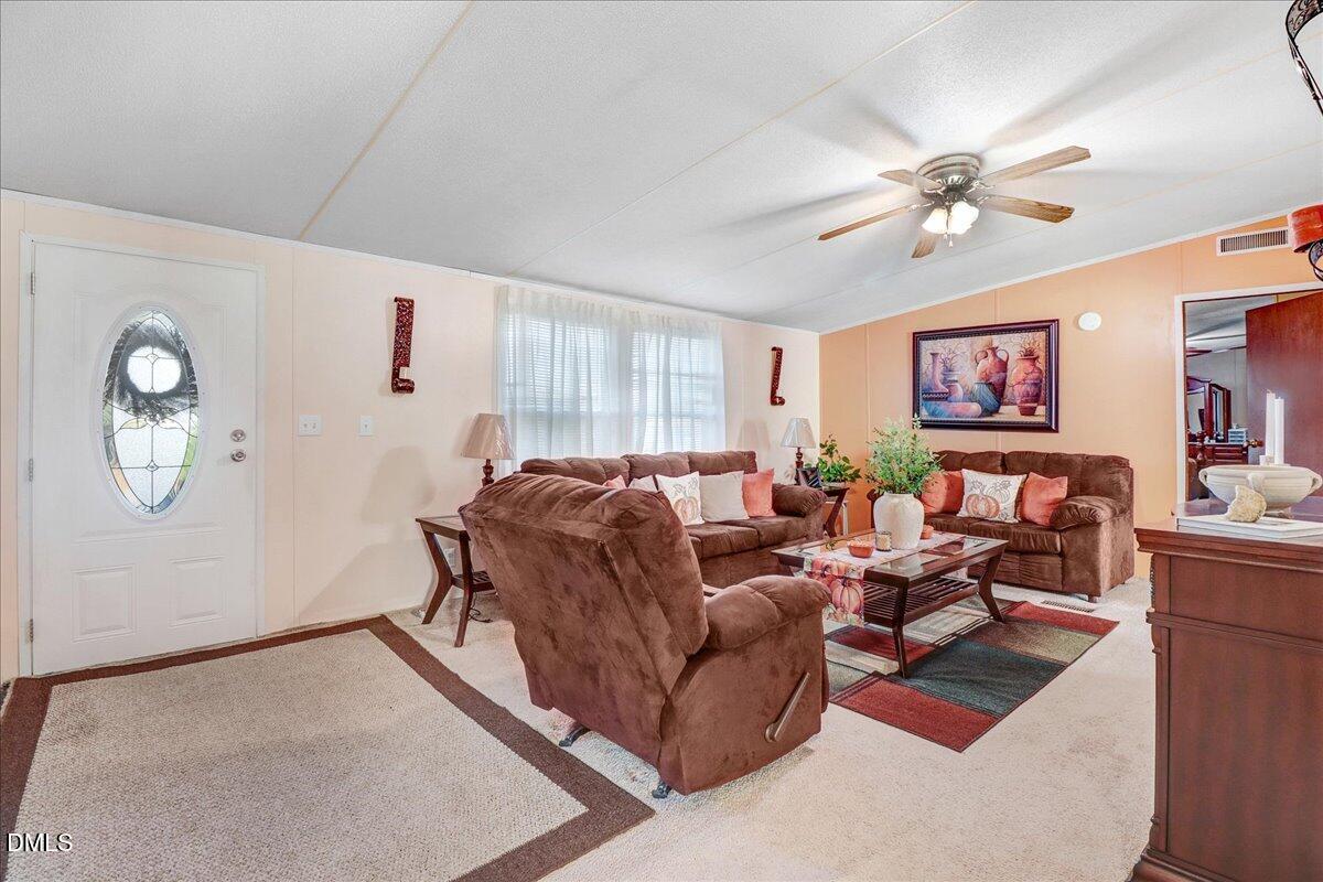 4305 Chinook Road Wilson, NC 27893 - Photo 15 of 37 a living room with furniture