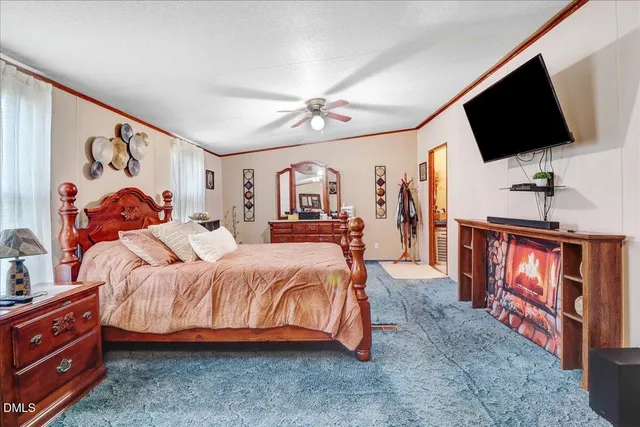 a bedroom with furniture and a bed