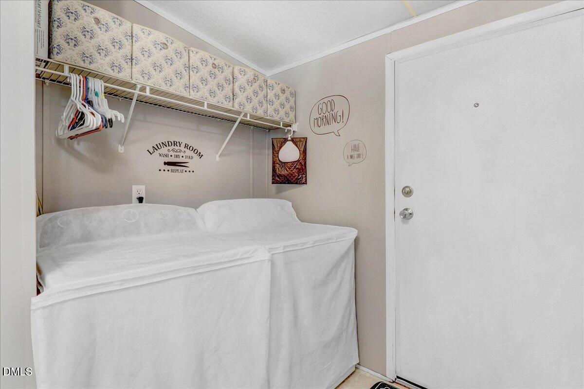 4305 Chinook Road Wilson, NC 27893 - Photo 36 of 37 a utility room with dryer and washer