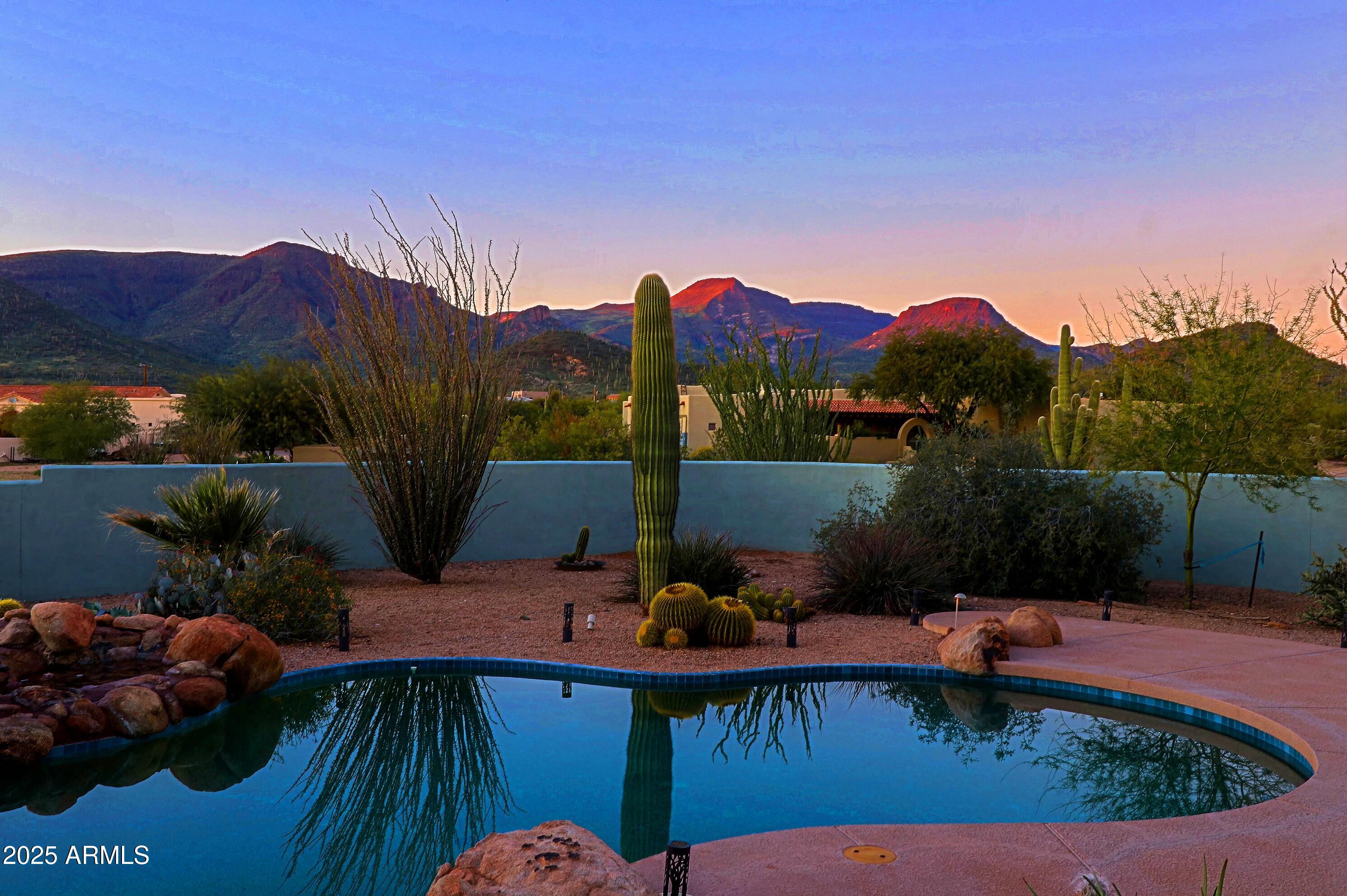 41840 North Spur Cross Road Cave Creek, AZ 85331 - Photo 39 of 67 a view of a swimming pool with a patio